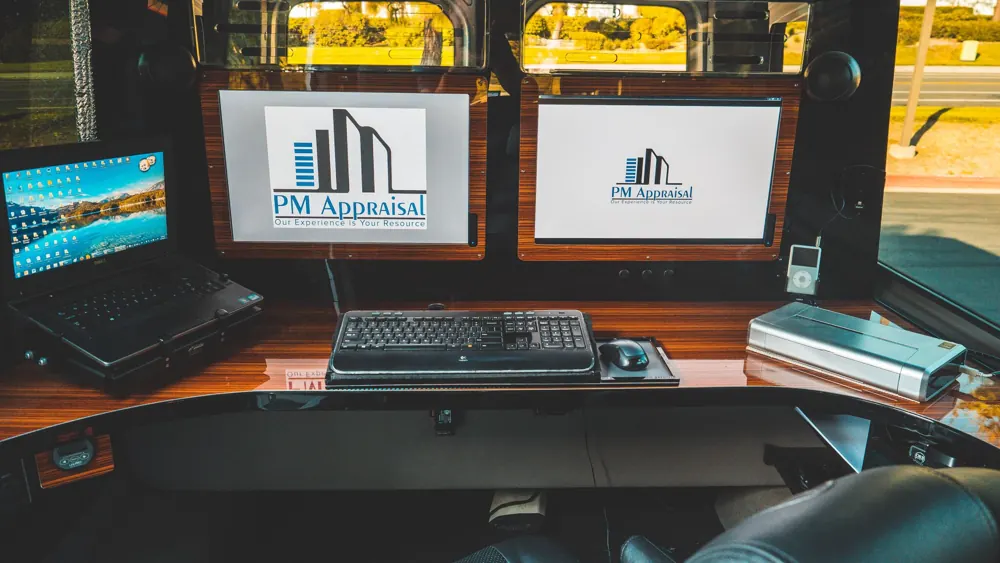 Workstation with PM Appraisal monitors inside the mobile appraisal vehicle